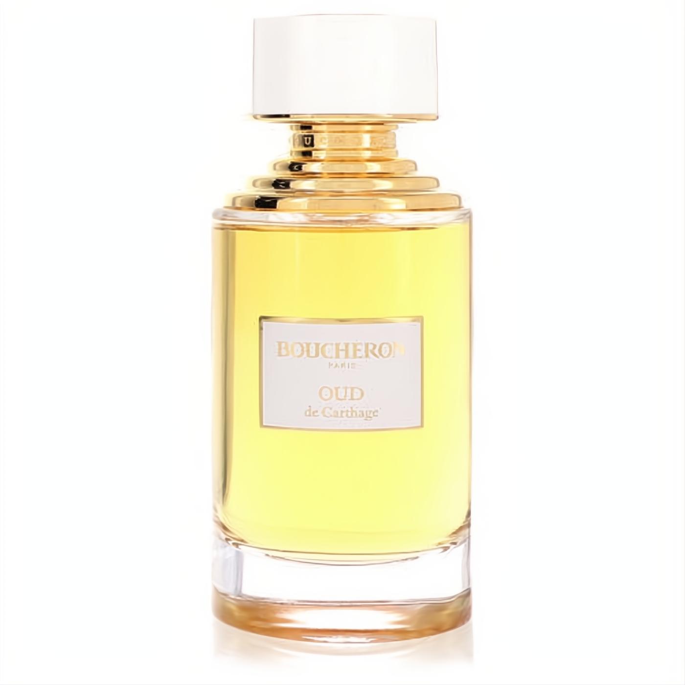 Elegant Boucheron Oud De Carthage EDP. Clear glass bottle with golden liquid, a distinctive gold ribbed neck, and a white cap.
