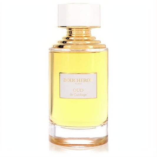 Elegant Boucheron Oud De Carthage EDP. Clear glass bottle with golden liquid, a distinctive gold ribbed neck, and a white cap.