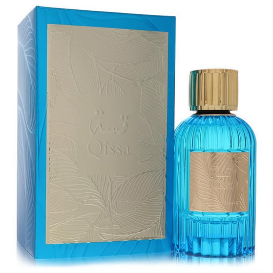 Luxurious Paris Corner Qissa unisex perfume: ribbed blue glass bottle, gold cap, and embossed gold label & box.