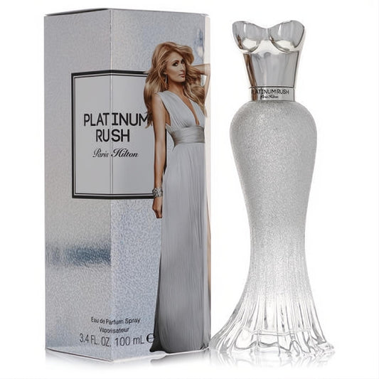 Paris Hilton Platinum Rush 3.4 oz EDP. Luxurious silver gown-shaped bottle with a metallic bustier cap, displayed with its shimmering box.