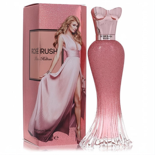 Paris Hilton Rose Rush 3.4 oz EDP. Shimmering rose gold perfume bottle, sculpted like a glamorous gown, with a chic pink box.