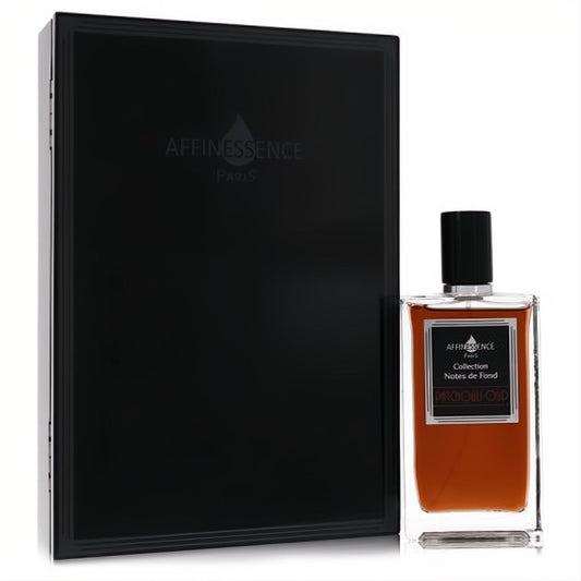 Affinessence Patchouli Oud 3.4 oz unisex EDP. Clear glass bottle with rich amber liquid, silver label, black cap, and sleek black gift box.