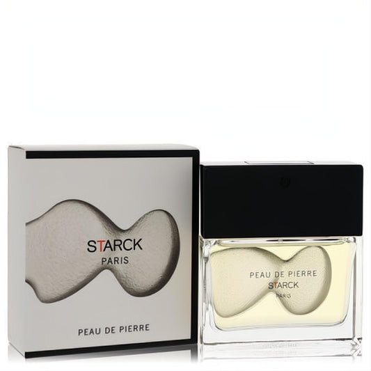 Peau De Pierre by Starck Paris 1.35 oz EDT. Elegant clear glass bottle with unique wavy yellow fragrance and sleek black cap.
