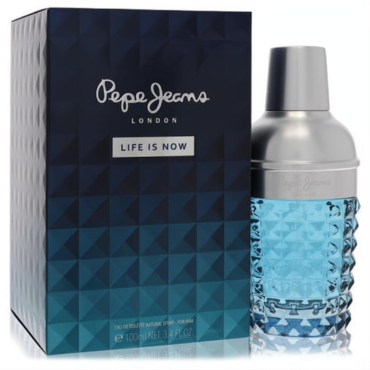 Pepe Jeans Life is Now 3.4 oz men's EDT. Unique blue textured glass shaker bottle with silver cap, beside dark blue geometric box.