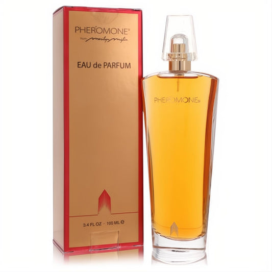 Luxurious Pheromone Eau de Parfum 3.4 oz spray bottle with golden liquid and elegant gold box with red trim.