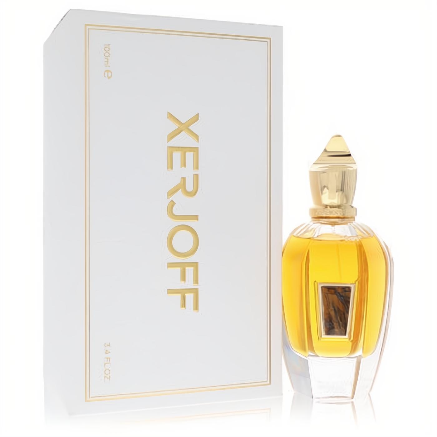 Exquisite Xerjoff Pikovaya Dama 3.4 oz EDP. Golden liquid in a faceted clear glass bottle with ornate gold cap, beside a white box.