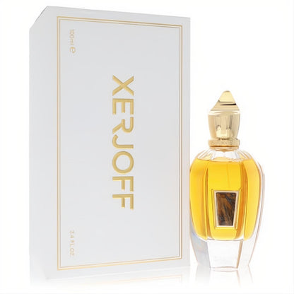 Exquisite Xerjoff Pikovaya Dama 3.4 oz EDP. Golden liquid in a faceted clear glass bottle with ornate gold cap, beside a white box.