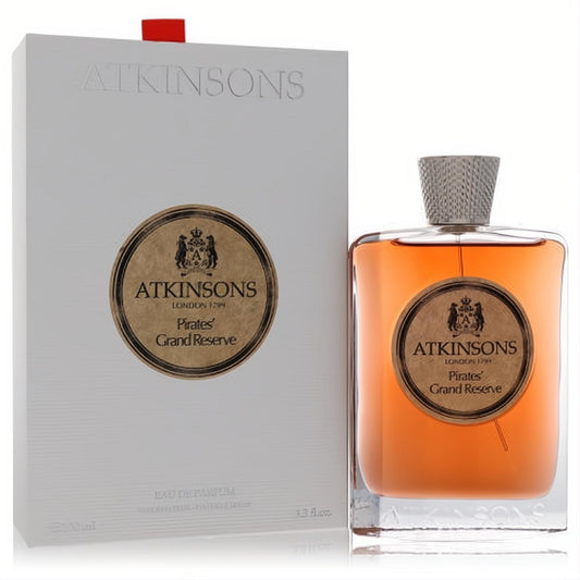 Luxurious Atkinsons Pirates' Grand Reserve 3.3 oz EDP. Clear glass bottle with rich amber liquid, textured silver cap, and elegant white box.