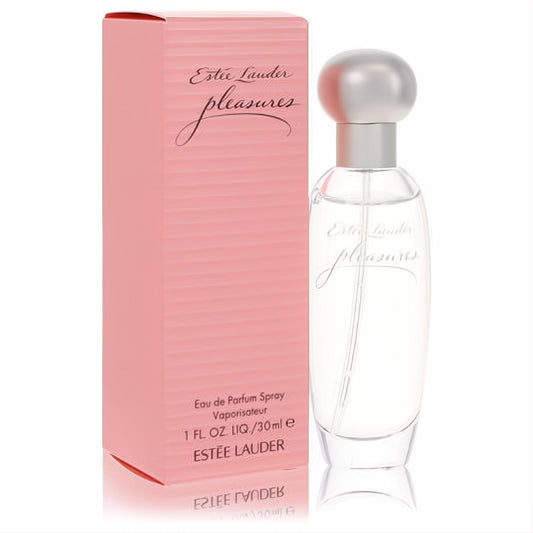 Estee Lauder Pleasures 1 oz EDP spray. Elegant clear glass bottle, silver cap, and chic pink ribbed box.