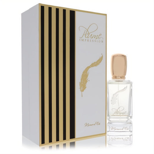 Luxurious Plume Impression Murmure d'Ete EDP. Elegant clear glass bottle with gold cap, beside its white, gold, and black striped box.