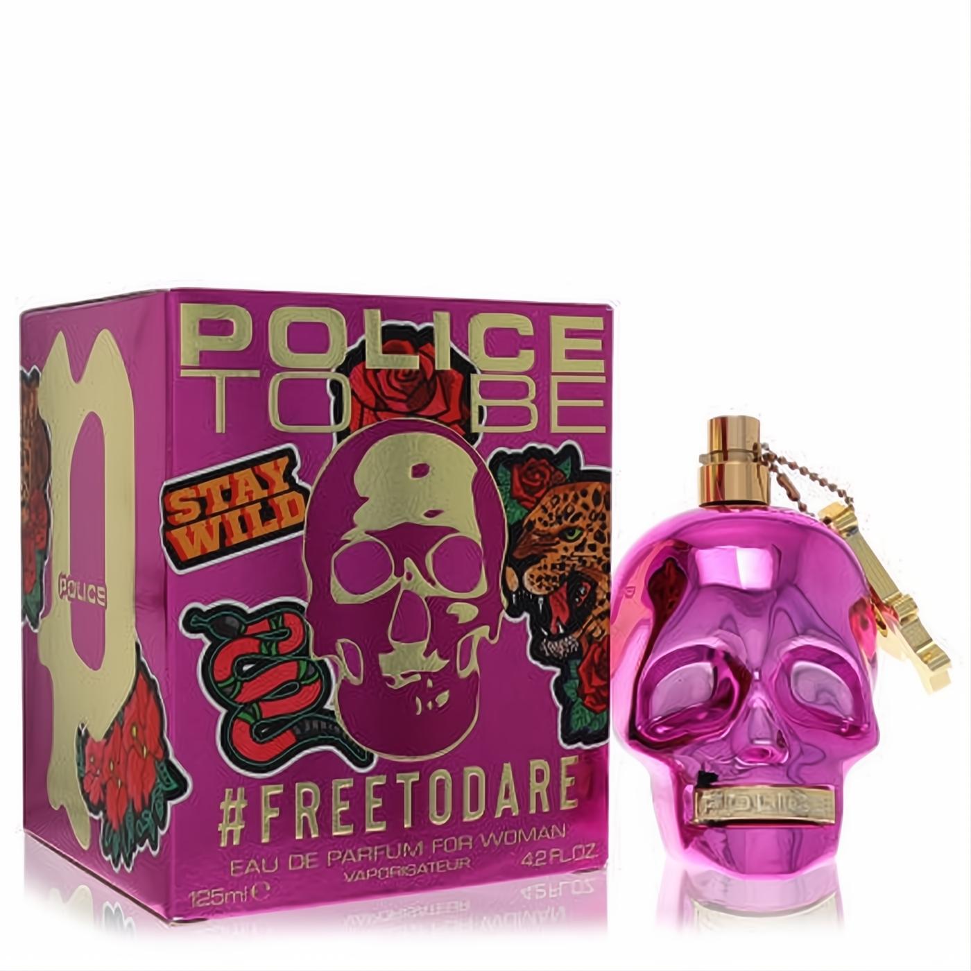 Police To Be #Freetodare 4.2 oz women's EDP: bold metallic pink skull bottle with gold key charm, next to its vibrant fuchsia box.
