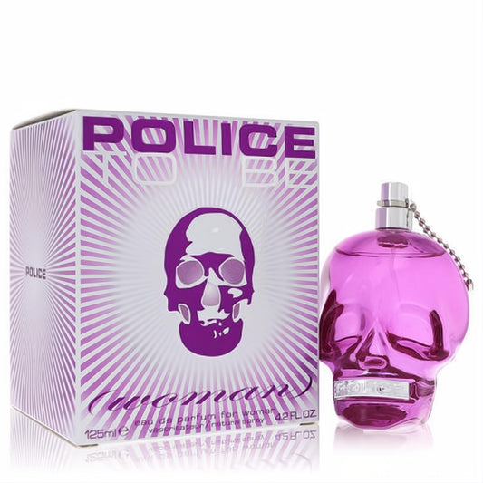 Police To Be Woman 4.2 oz EDP spray. Iconic pink skull bottle and vibrant purple box for a bold fragrance.