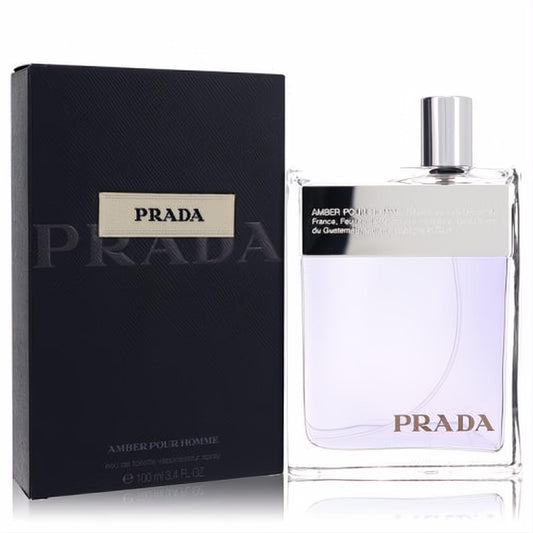 Luxurious Prada Amber Pour Homme 3.4 oz EDT spray. Clear glass bottle with purple liquid, silver cap, and sleek dark embossed box.