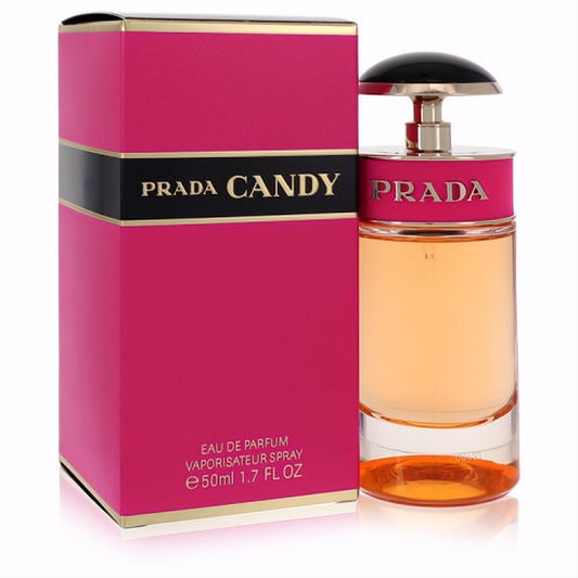 Vibrant Prada Candy 1.7 oz EDP spray: hot pink box with gold accents, elegant clear bottle with amber liquid, black dome cap.
