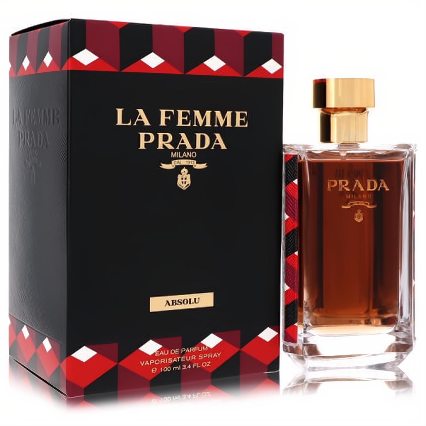 Prada La Femme Absolu 3.4 oz EDP. Amber fragrance in a sleek glass bottle with gold cap, beside its black and red patterned box.