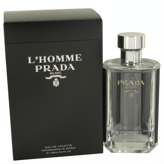 Prada L'Homme 3.4 oz EDT. Clear glass bottle with silver cap, iconic black side panels, and sleek matte black box.