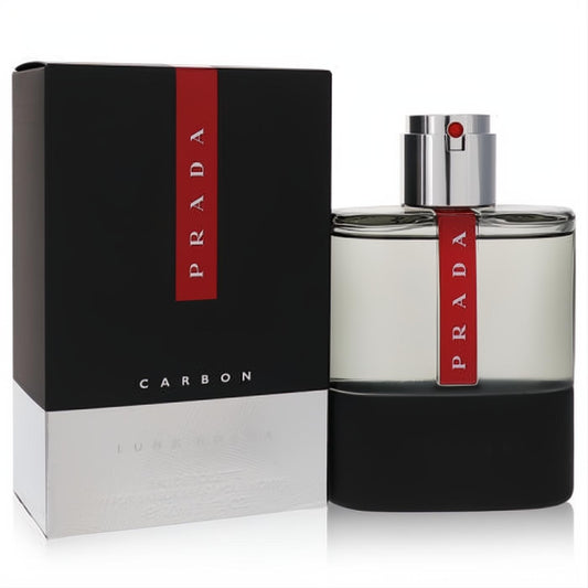 Sleek Prada Luna Rossa Carbon 3.4 oz men's cologne. Clear glass and matte black bottle with a bold red stripe, beside its matching box.