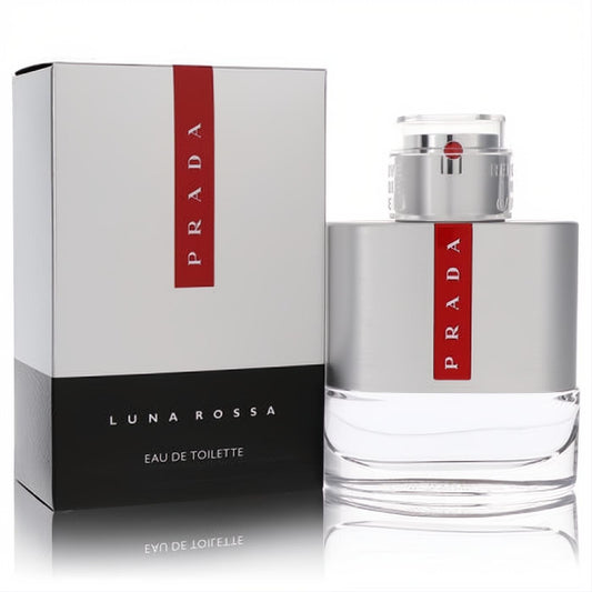 Prada Luna Rossa Eau De Toilette spray. Sleek silver and clear bottle with iconic red stripe, beside matching box.