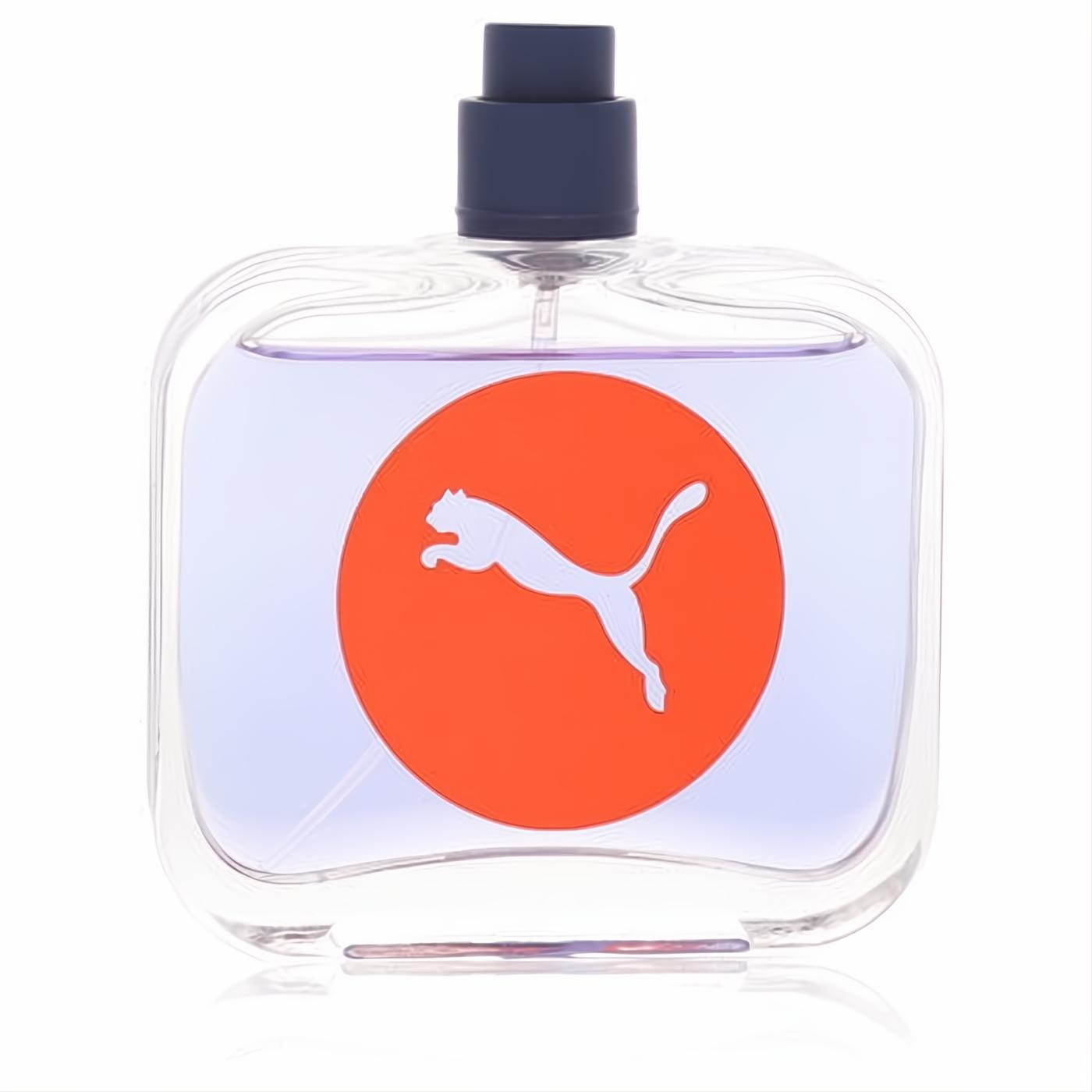 Puma Sync 2 oz men's EDT spray: clear glass bottle, vibrant purple liquid, bold orange Puma logo, sleek navy cap.