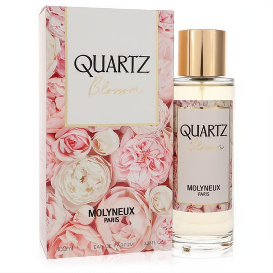 Molyneux Quartz Blossom 3.38 oz women's EDP spray. Clear bottle, gold cap, and elegant pink rose floral box.