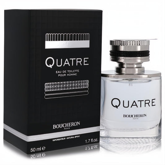 Boucheron Quatre Eau De Toilette 1.7 oz. Sleek clear glass bottle with iconic ribbed silver cap and elegant black box.