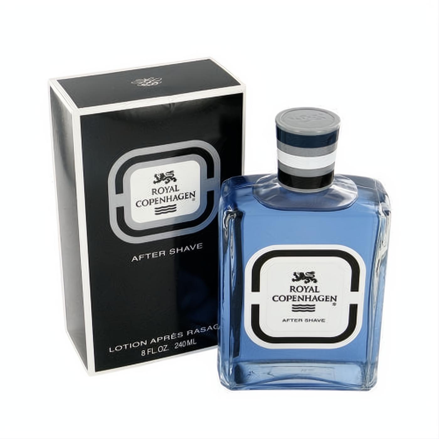 Royal Copenhagen After Shave 8 oz blue lotion in a classic clear glass bottle and elegant black box. Refined masculine fragrance.