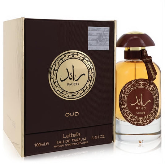 Luxurious Lattafa Ra'ed Oud unisex EDP, 3.4 oz. Amber liquid in elegant bottle with brown cap, gold accents, and matching box.
