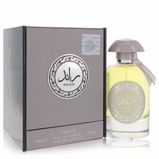 Elevate your scent with Raed Silver Lattafa unisex EDP, 3.4 oz. Clear bottle, grey cap with ribbon, elegant textured box.
