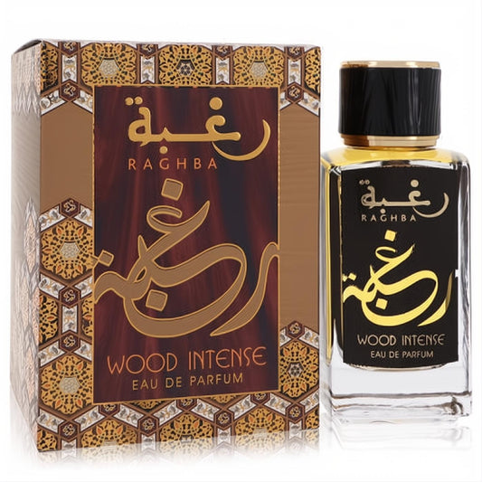Raghba Wood Intense 3.4 oz unisex perfume. Elegant clear bottle with golden liquid, black label, and ornate gold-patterned brown box.