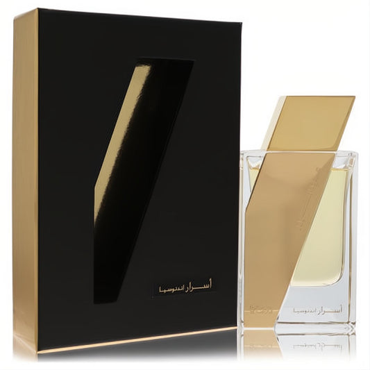 Rasasi Atar Al Boruzz Asrar Indonesia perfume. Clear bottle, bold gold angular design, and luxurious black & gold box.