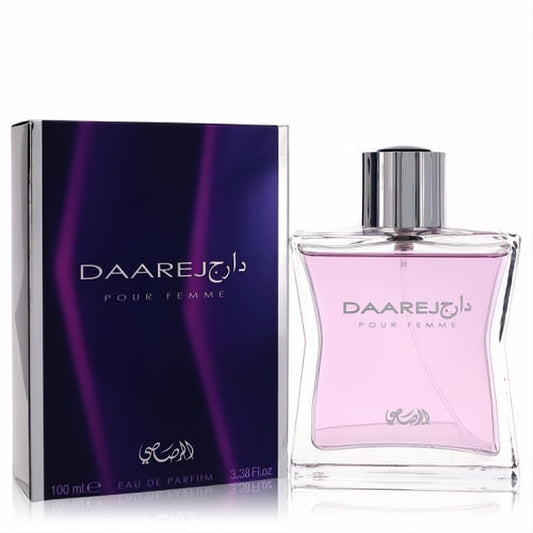 Captivating Rasasi Daarej Pour Femme Eau De Parfum 3.38 oz. Elegant pink fragrance in a clear bottle with a luxurious purple box.