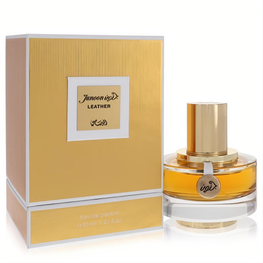 Rasasi Junoon Leather 1.67 oz Eau De Parfum. Luxurious gold striped box and clear bottle with captivating amber scent.