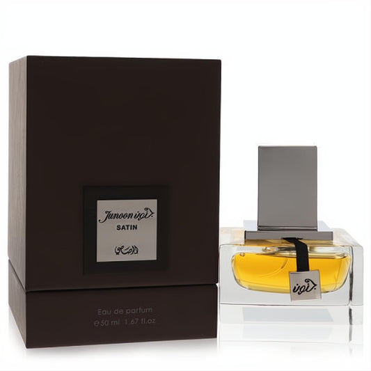 Rasasi Junoon Satin 1.67 oz men's Eau De Parfum. Clear bottle with golden liquid, sleek silver cap, and luxurious matte brown box.