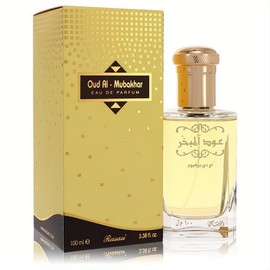 Elevate your scent with Rasasi Oud Al Mubakhar 3.3 oz unisex Eau De Parfum. Elegant clear glass bottle, gold cap, and luxurious gold box.