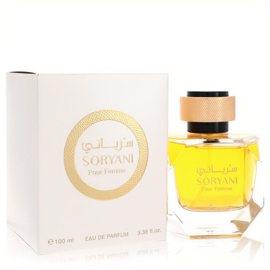 Rasasi Soryani Pour Femme 3.38 oz EDP. Elegant clear bottle with radiant yellow fragrance, gold cap, and matching white box.