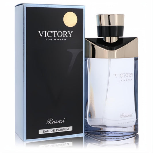 Elegant Rasasi Victory For Women 3.3 oz EDP spray bottle with sleek black and gold accents, displayed beside its luxurious matching box.