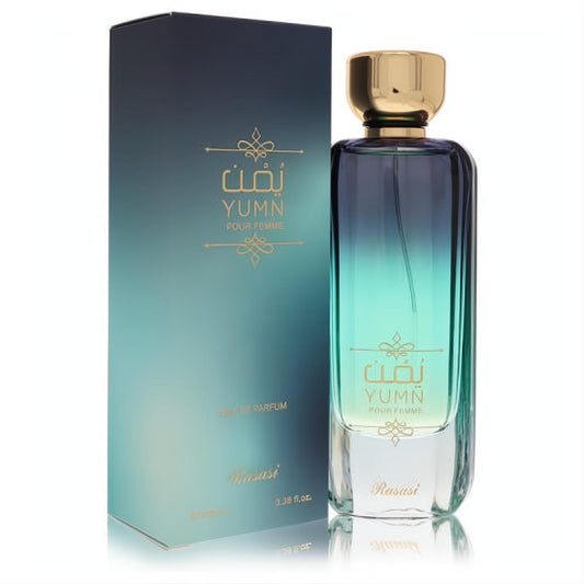 Rasasi Yumn 3.38 oz women's perfume: sleek blue-teal gradient glass bottle with a luxurious gold cap and matching box.