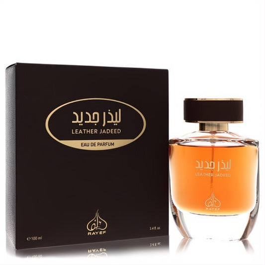 Elegant Rayef Leather Jadeed 3.4 oz unisex Eau De Parfum. Amber fragrance in a sleek glass bottle with a sophisticated dark brown box.