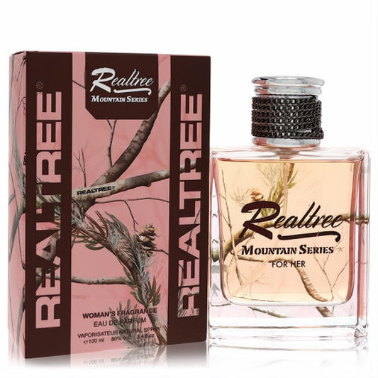 Realtree Mountain Series 3.4 oz women's perfume. Clear bottle with warm amber liquid, silver cap, and stylish pink camo box.