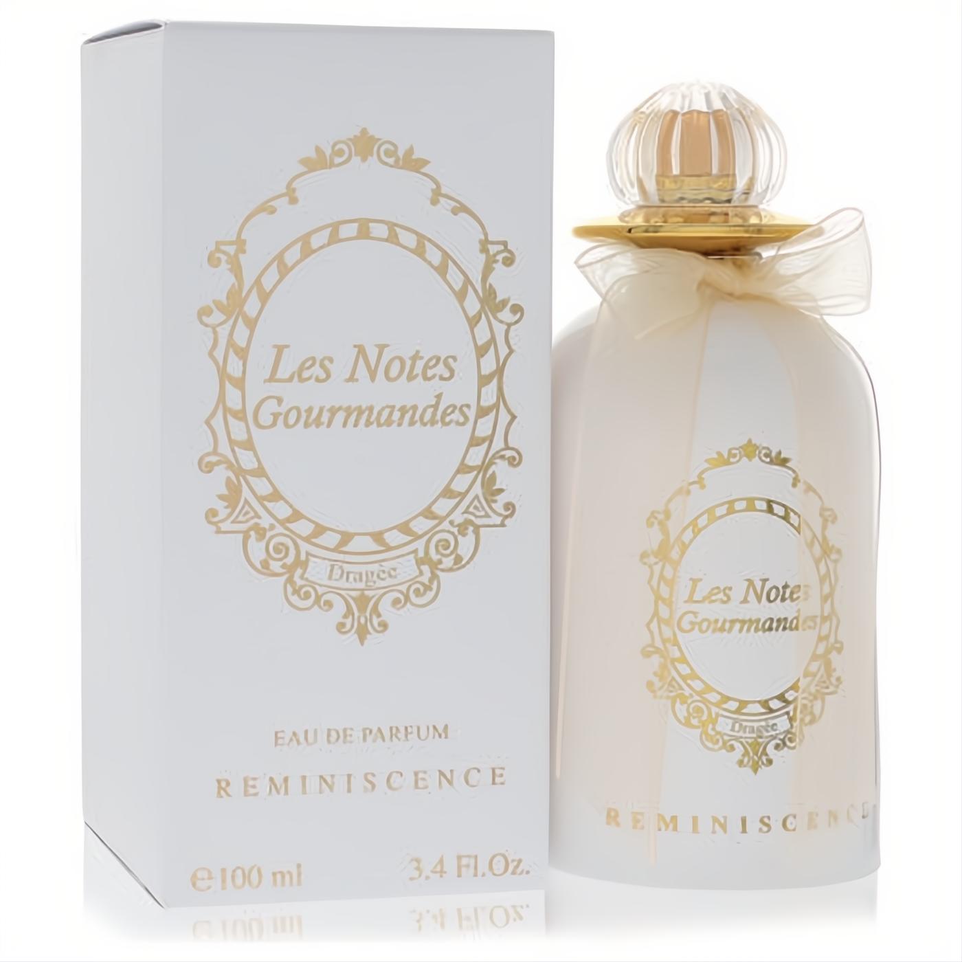 Reminiscence Dragee 3.4 oz EDP. Elegant white bottle with ornate gold 'Les Notes Gourmandes' design, clear cap, and sheer ribbon. Matching box.