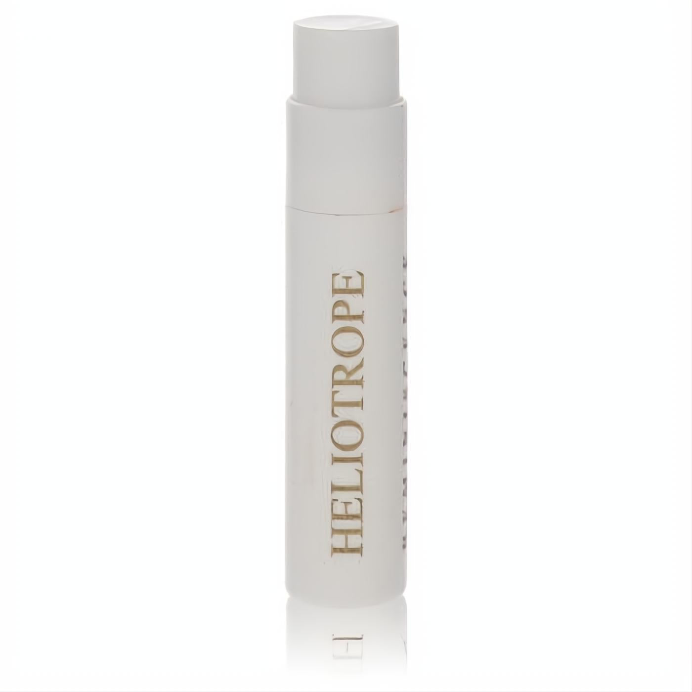 Reminiscence Heliotrope .04 oz sample perfume vial. Sleek frosted white design with elegant gold lettering.
