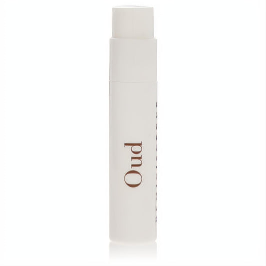 Elegant white Reminiscence Oud perfume sample vial, .04 oz, featuring "Oud" in rich brown. Experience luxury.