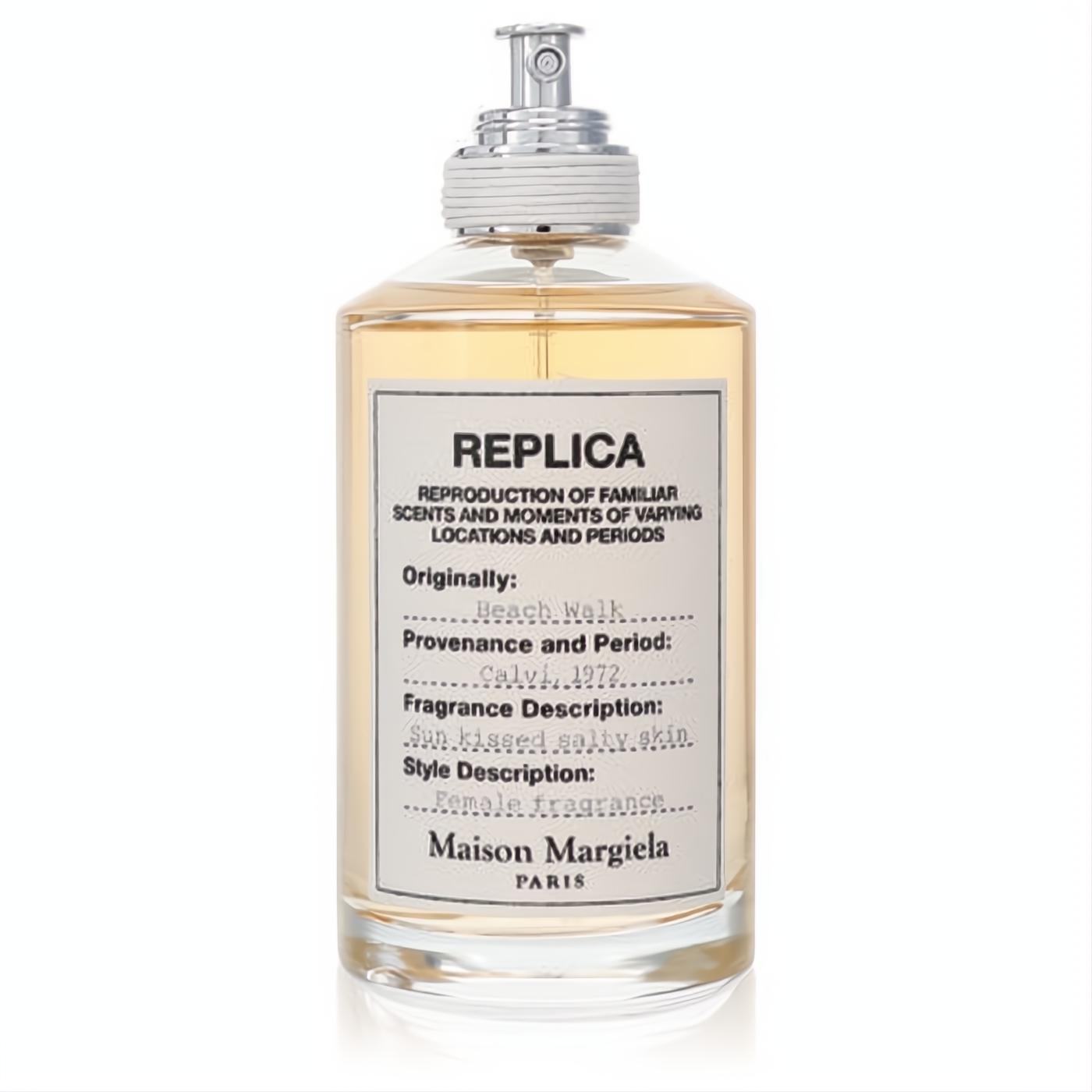 Maison Margiela Replica Beachwalk EDT in a clear glass bottle with golden liquid, white label, and sleek silver spray top.