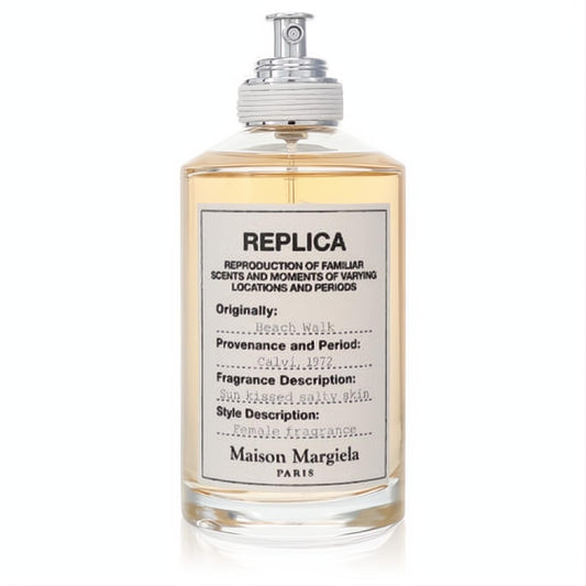 Maison Margiela Replica Beachwalk EDT in a clear glass bottle with golden liquid, white label, and sleek silver spray top.