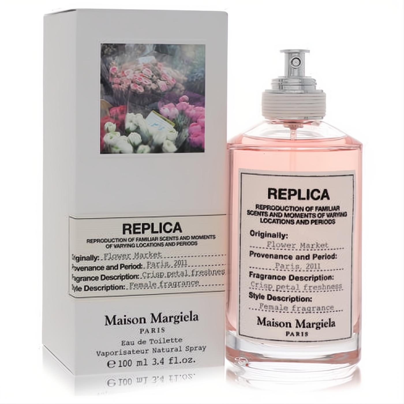 Maison Margiela Replica Flower Market 3.4 oz EDT. Captivating pink fragrance in a sleek clear bottle with silver cap and white floral box.