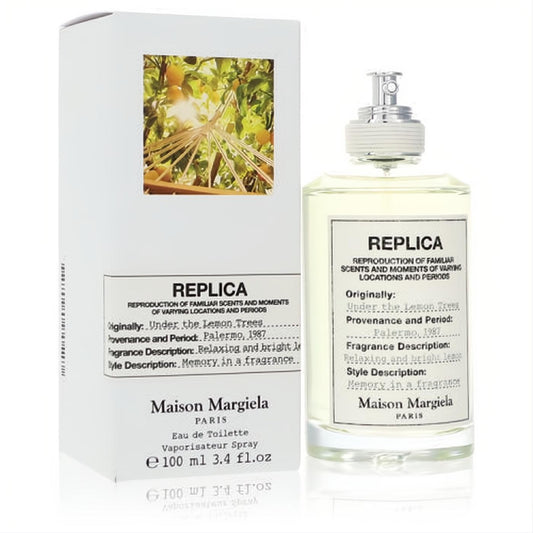 Maison Margiela Replica Under The Lemon Trees 3.4 oz EDT. Elegant clear bottle, silver atomizer, and white box with sunny lemon grove art.