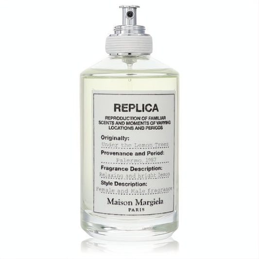 Elegant Maison Margiela Replica Under The Lemon Trees fragrance. Clear glass bottle, minimalist white label, sleek silver sprayer.