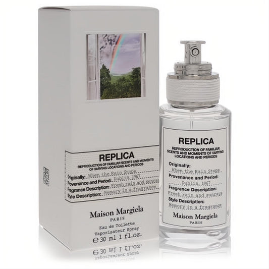 Maison Margiela Replica When The Rain Stops 1 oz EDT. Fresh rain scent in an elegant clear bottle, iconic rainbow box.