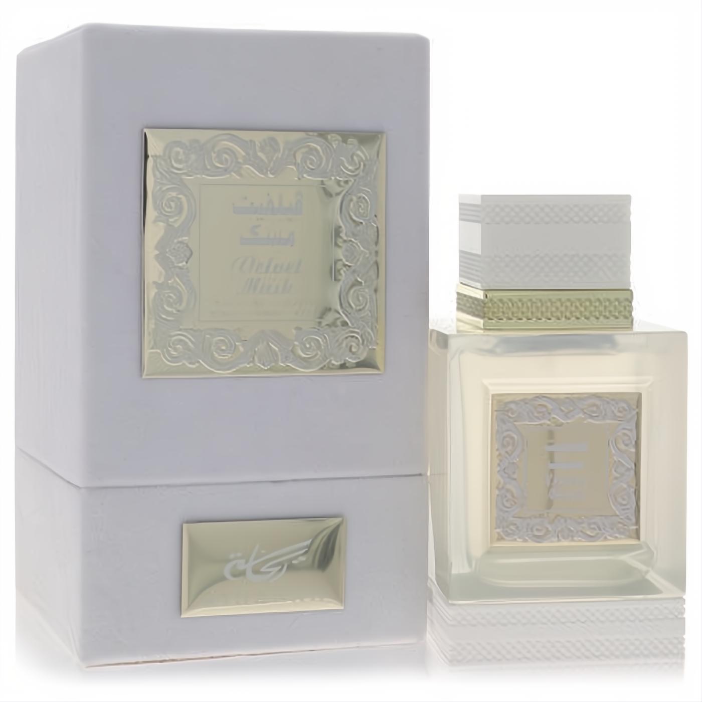 Stunning Rihanah Velvet Musk 4.2 oz EDP. Clear glass bottle with ornate gold label and luxurious white gift box.