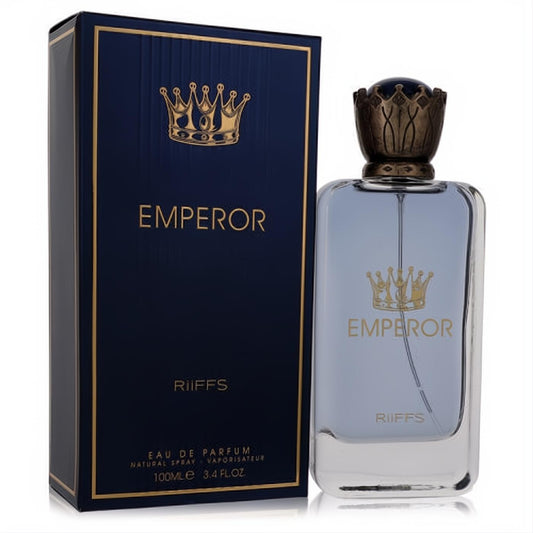 Luxurious Riiffs Emperor 3.4 oz men's EDP. Clear bottle, light blue liquid, ornate gold crown cap, and matching navy box.